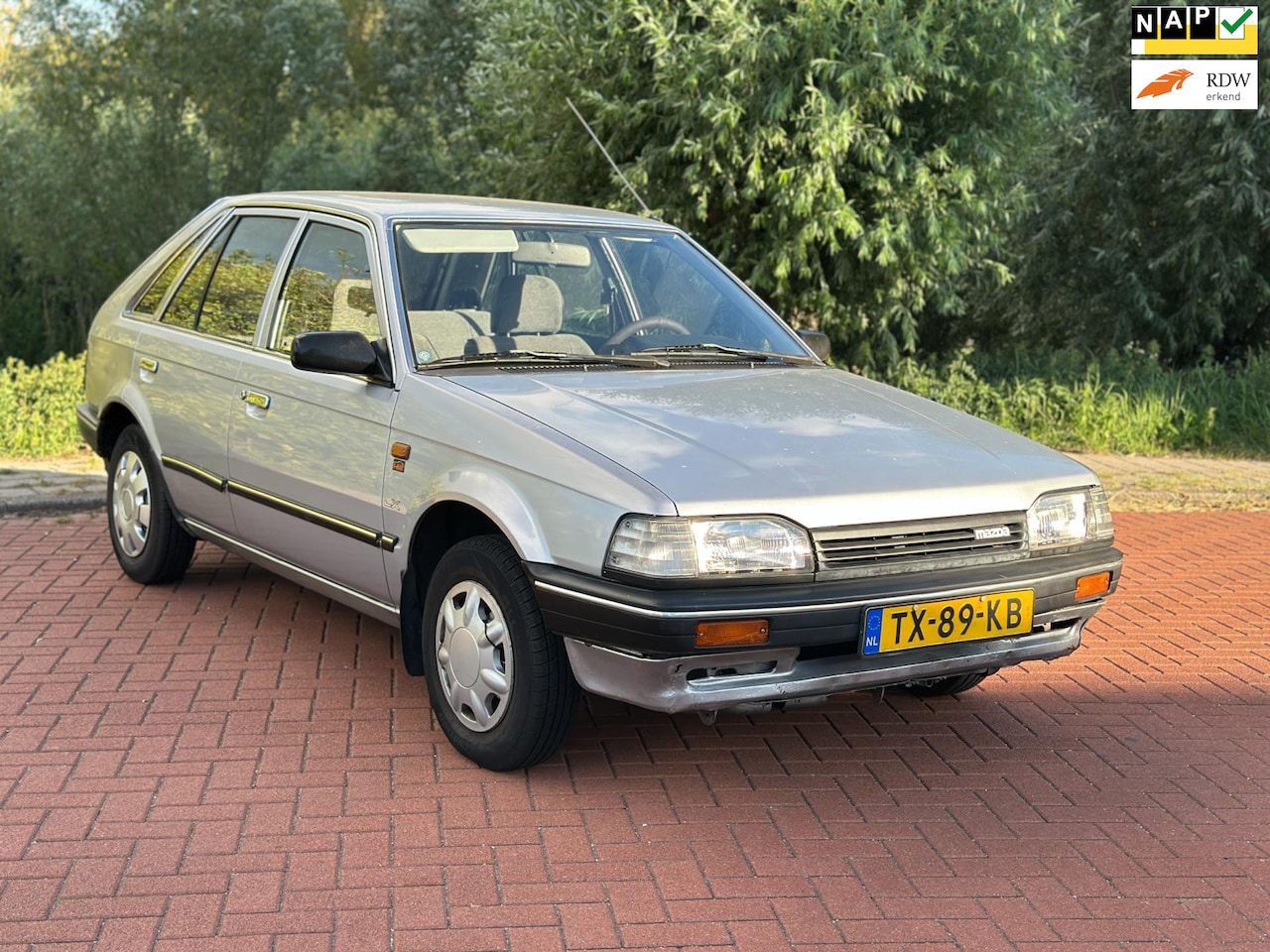 Mazda 323 - 1.3 LX Automaat/Nap - AutoWereld.nl