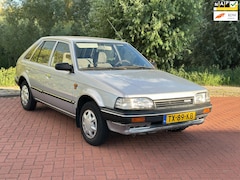 Mazda 323 - 1.3 LX Automaat/Nap
