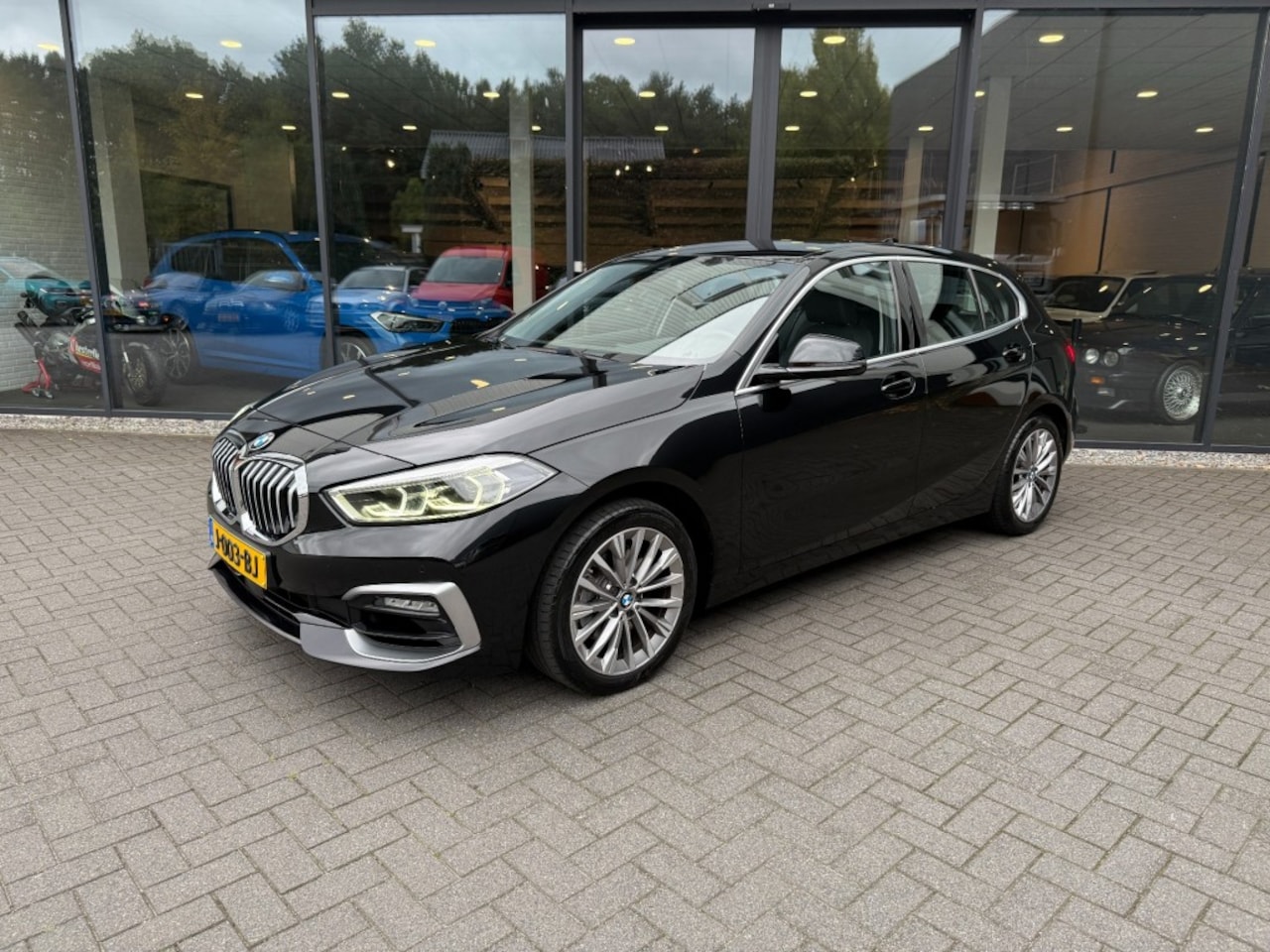 BMW 1-serie - 118I High Exe,Leer,Memory,LED,Stoelverw,Clima,Lane Ass.,Cruise - AutoWereld.nl