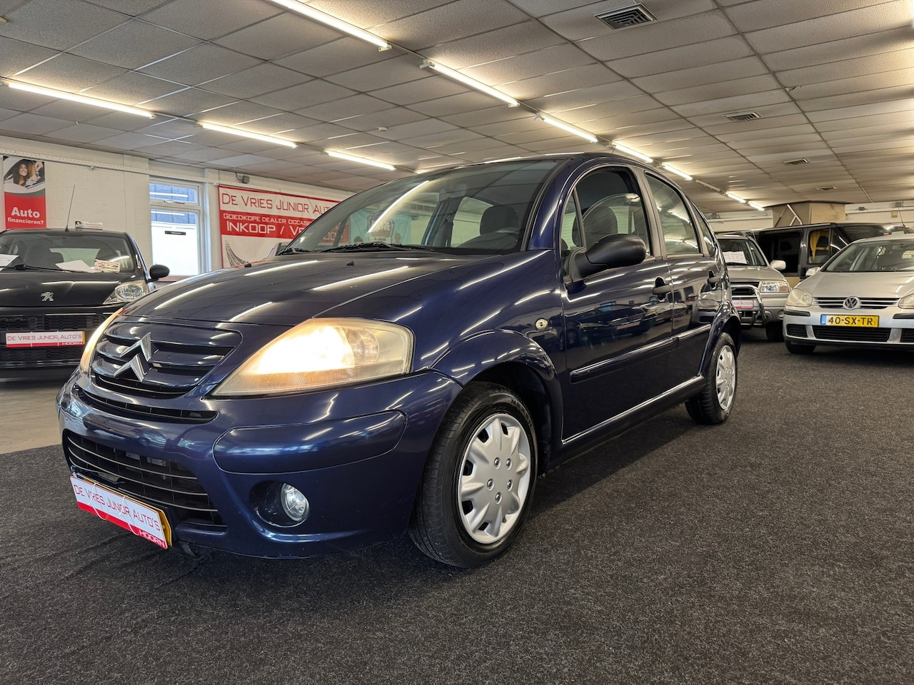 Citroën C3 - 1.1i Sky Radio. Cruise control, airco, bt/usb en meer! - AutoWereld.nl