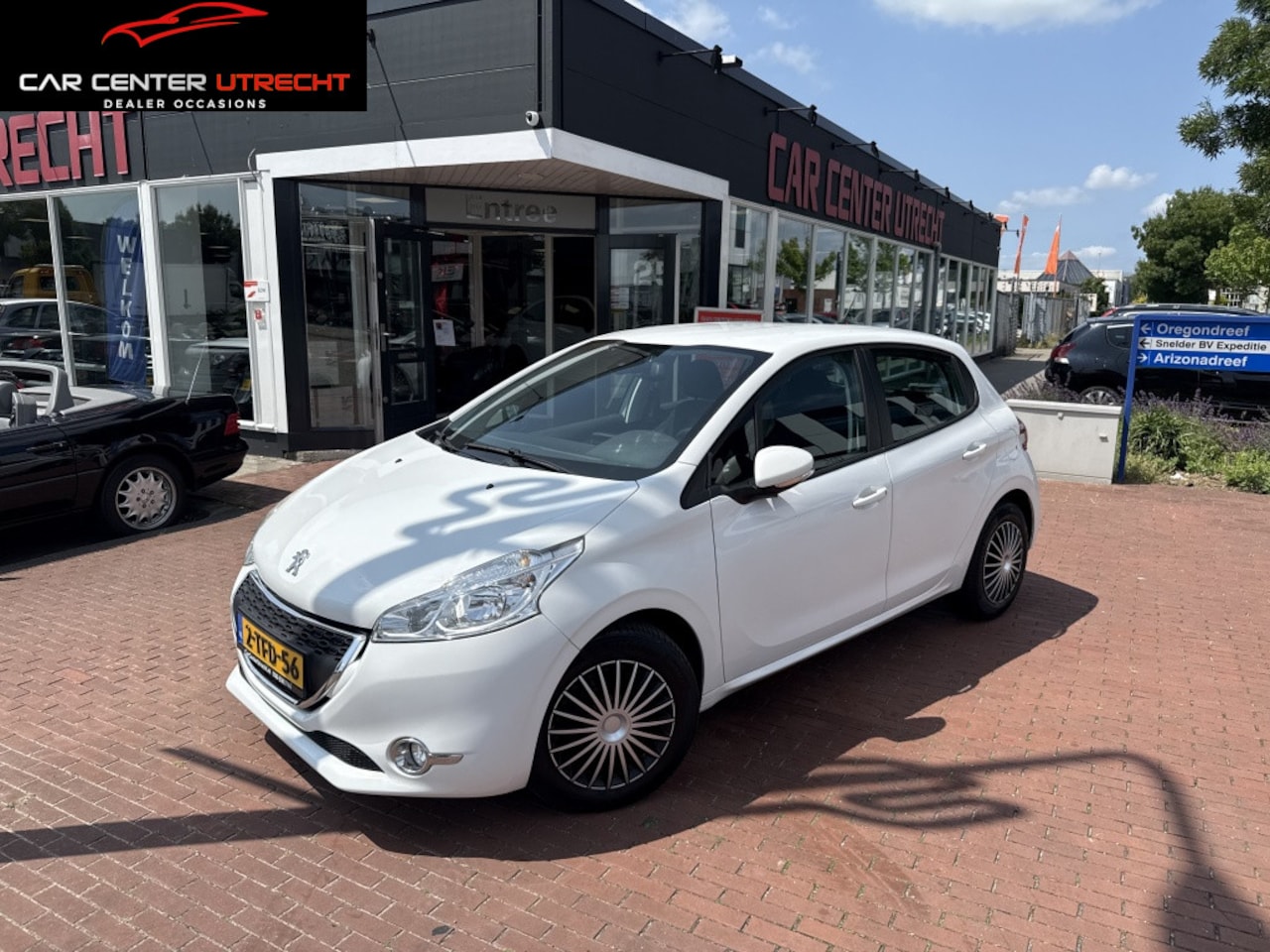 Peugeot 208 - 1.2 VTi Envy | airco | navi | cruise control | - AutoWereld.nl