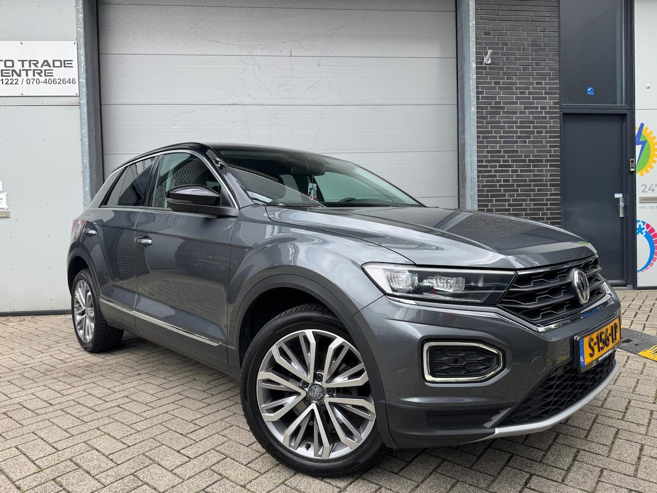 Volkswagen T-Roc - 1.5 TSI Style [Camera|Carplay|StoelVW|Lane assist] - AutoWereld.nl