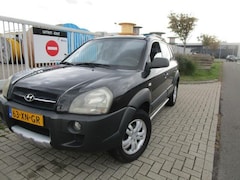 Hyundai Tucson - 2.0i Dynamic Cross, Lezen aub