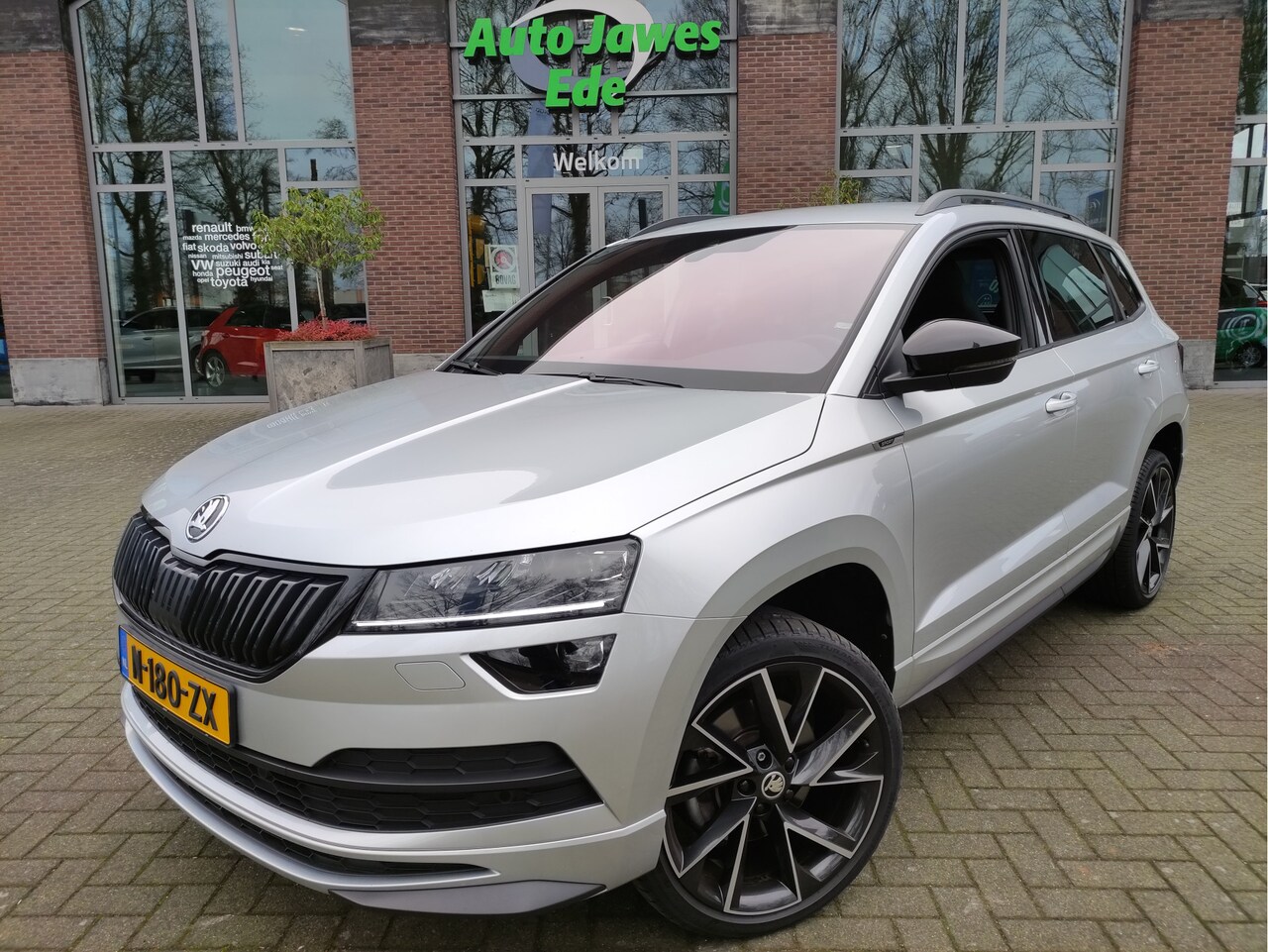 Skoda Karoq - 1.5 TSI DSG ACT Sportline Business Leder - Adaptieve Cr.control - Blindspot detectie - Can - AutoWereld.nl