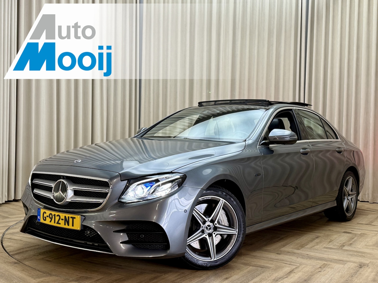 Mercedes-Benz E-klasse - 300 e Business Solution AMG *Panoramadak* Burmester / Adapt. Cruise / Memory / LED / Sfeer - AutoWereld.nl