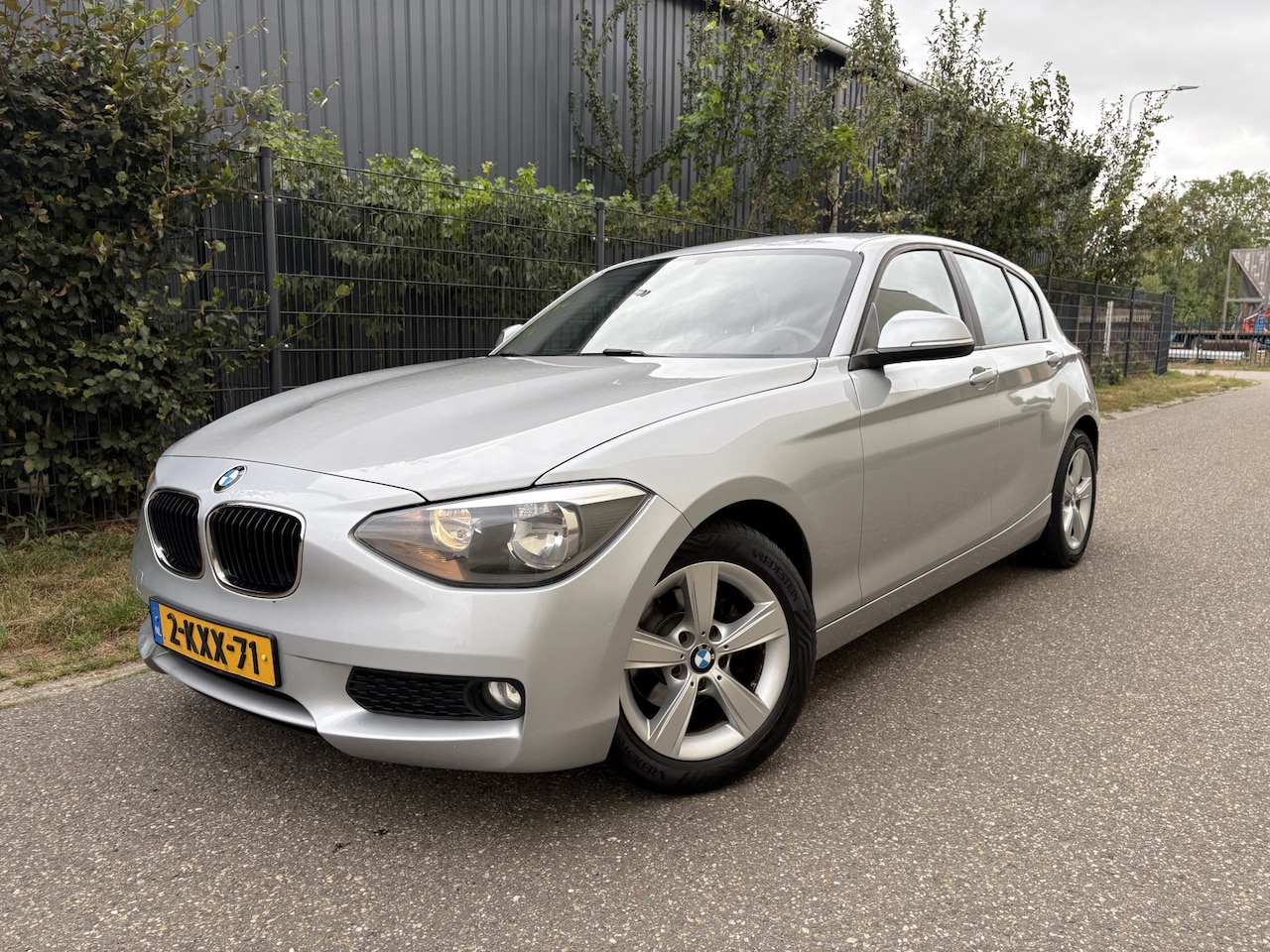 BMW 1-serie - 114i EDE Business / NAVI / CRUISE / AIRCO - AutoWereld.nl