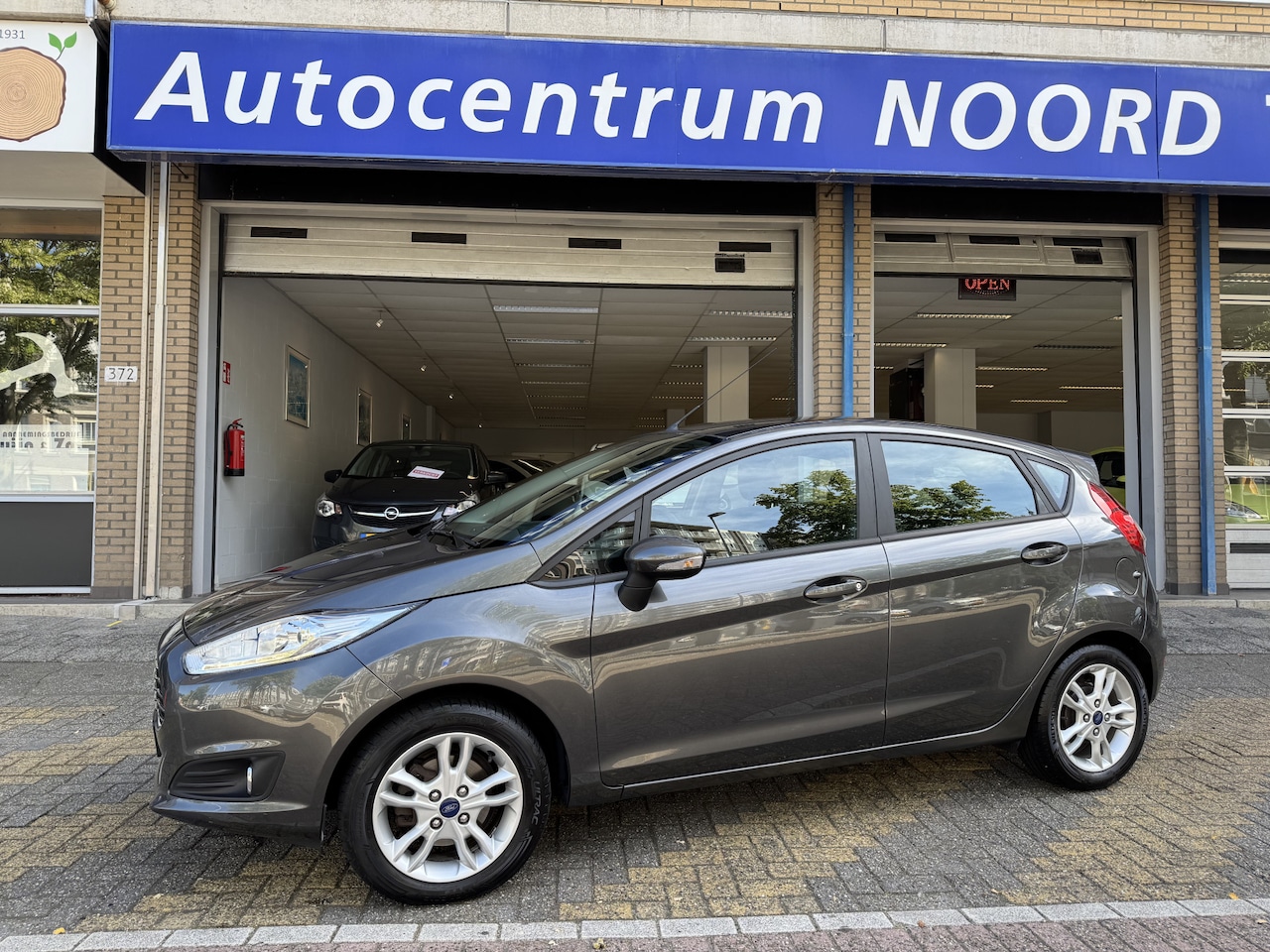 Ford Fiesta - 1.0 Style 72575KM! | Airco | Stoelverwarming | Lichtmetalen Velgen | Dealeronderhouden | - AutoWereld.nl
