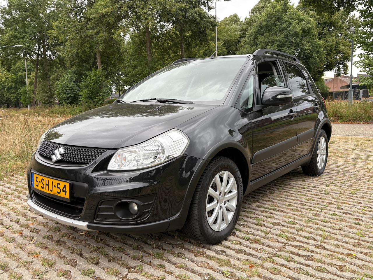 Suzuki SX4 - 1.6 Executive / airco / stoelverwarming / nette auto - AutoWereld.nl