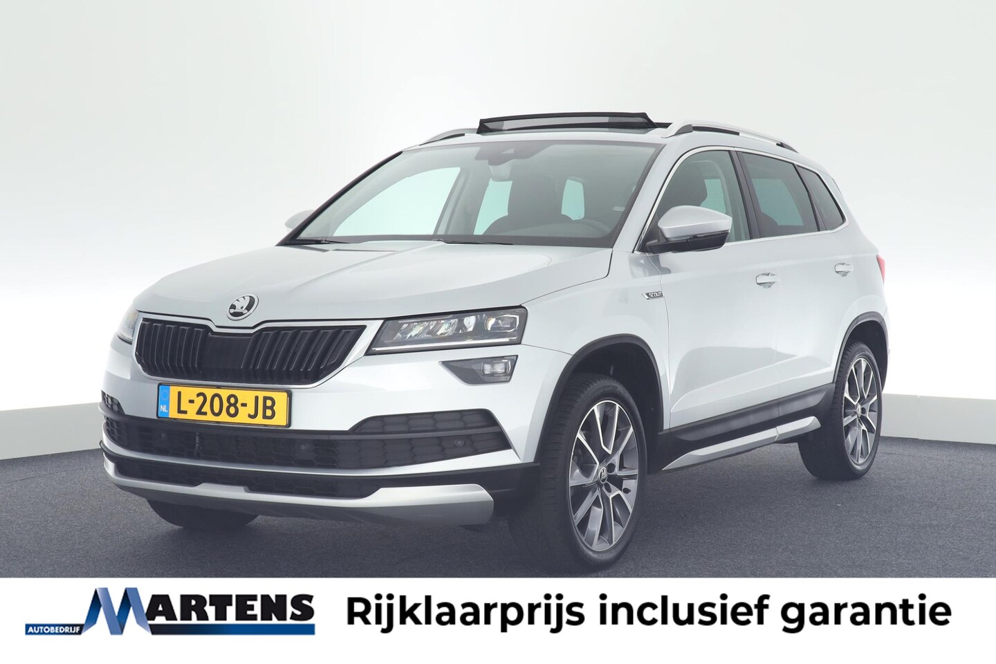 Skoda Karoq - 1.5 TSI 150pk DSG ACT Scout Camera Keyless Stoelverwarming Virtual Cockpit Panoramadak Nav - AutoWereld.nl