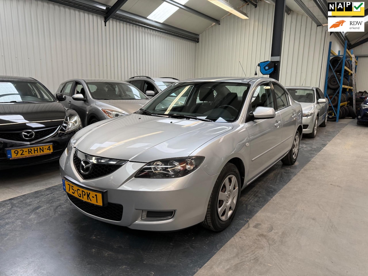 Mazda 3 - 1.6 S-VT Touring LAGE KM/AIRCO/NAP/APK - AutoWereld.nl