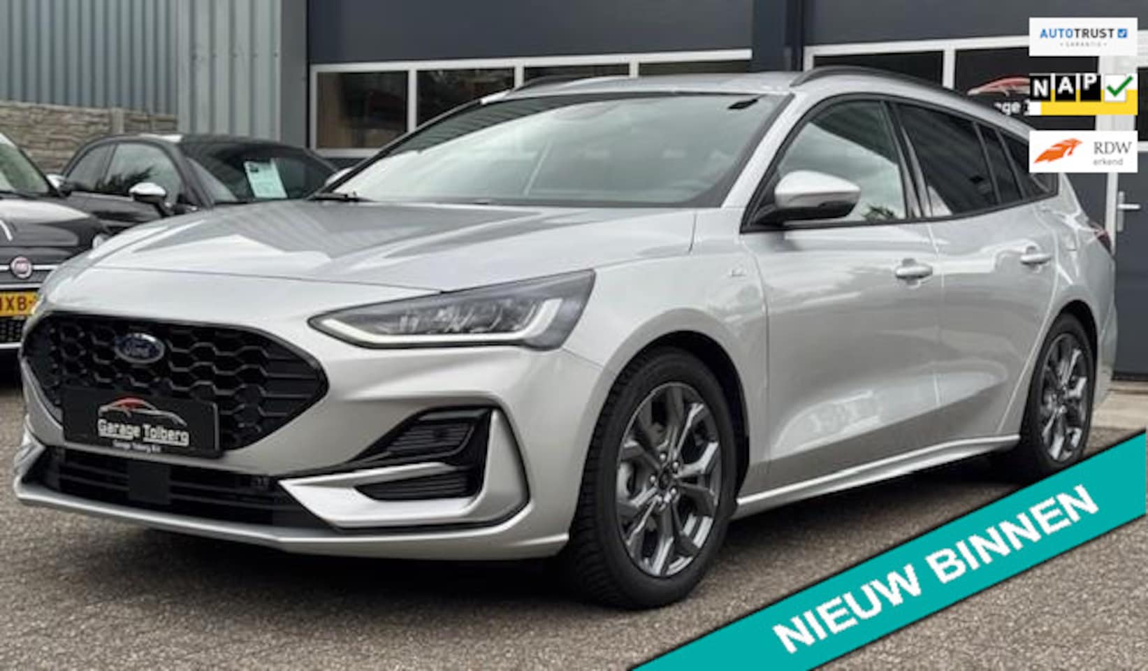 Ford Focus Wagon - 1.0 EcoBoost Hybrid ST Line in stijl volgrijs, nog geen 1100 km sportief design. rij als n - AutoWereld.nl