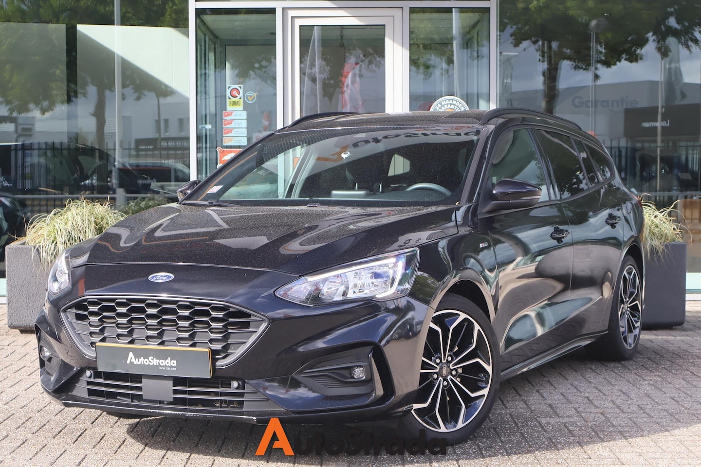 Ford Focus Wagon - 1.0 ST-Line 125pk | Navigatie | Climate | Cruise | LED | Camera | Radio | Bluetooth | Keyl - AutoWereld.nl