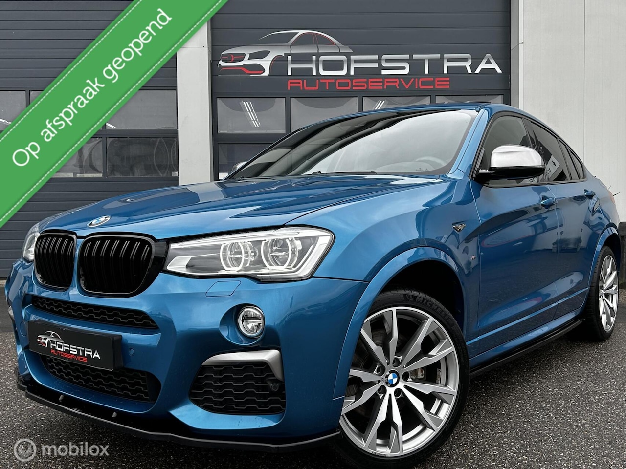 BMW X4 - M40i High Executive Pano H&K Trekhk Camera Head-Up Dab - AutoWereld.nl