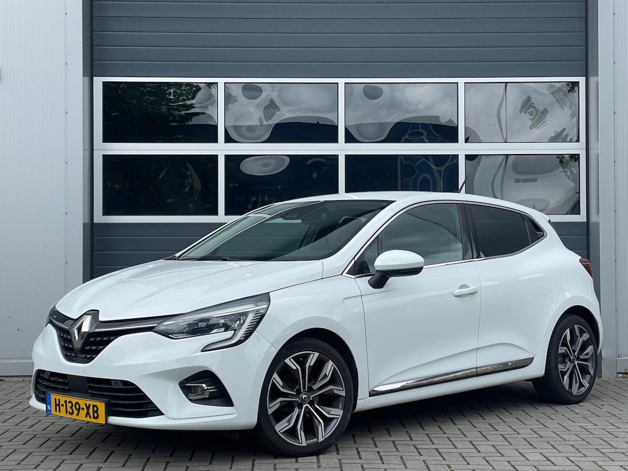 Renault Clio - 1.0 TCe Intens | Camera | Keyless | Full LED | Navi | PDC v+a | Climate control | Cruise c - AutoWereld.nl