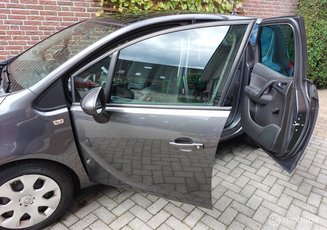Opel Meriva - 1.4 Turbo Cosmo 1.4 Turbo Cosmo (Panorama/APK 12-7-26/Fietsendr) - AutoWereld.nl