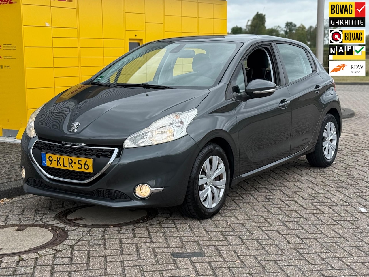 Peugeot 208 - 1.2 VTI Bj 2013 5Drs ECC Airco Navi Pdc D-riem vv - AutoWereld.nl