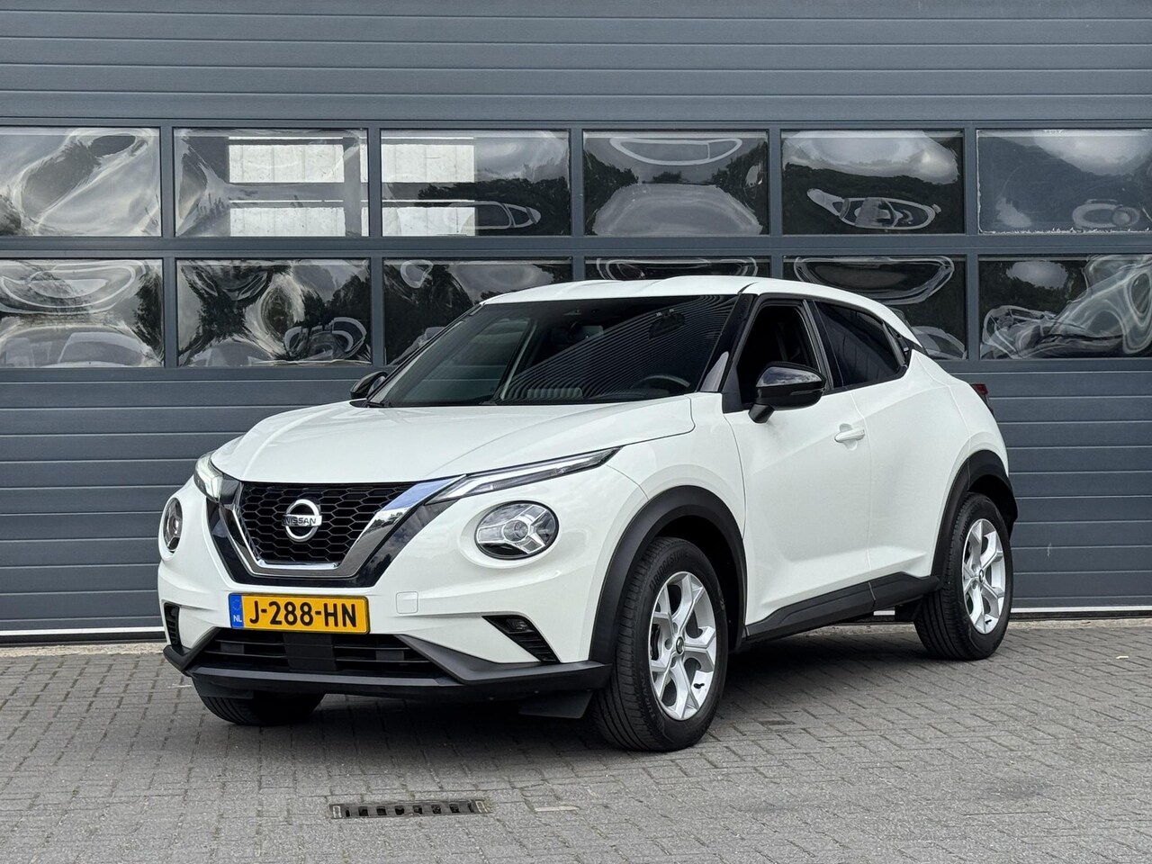 Nissan Juke - 1.0 DIG-T N-CONNECTA I ACHTERUITRIJCAMERA I APPLE CARPLAY I CRUISE CONTROL I CLIMATE CONTR - AutoWereld.nl