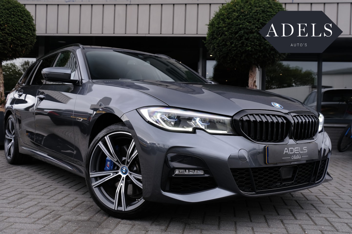 BMW 3-serie Touring - 330e xDrive High Executive M Sport Panodak LaserLed HUD Keyless ACC - AutoWereld.nl
