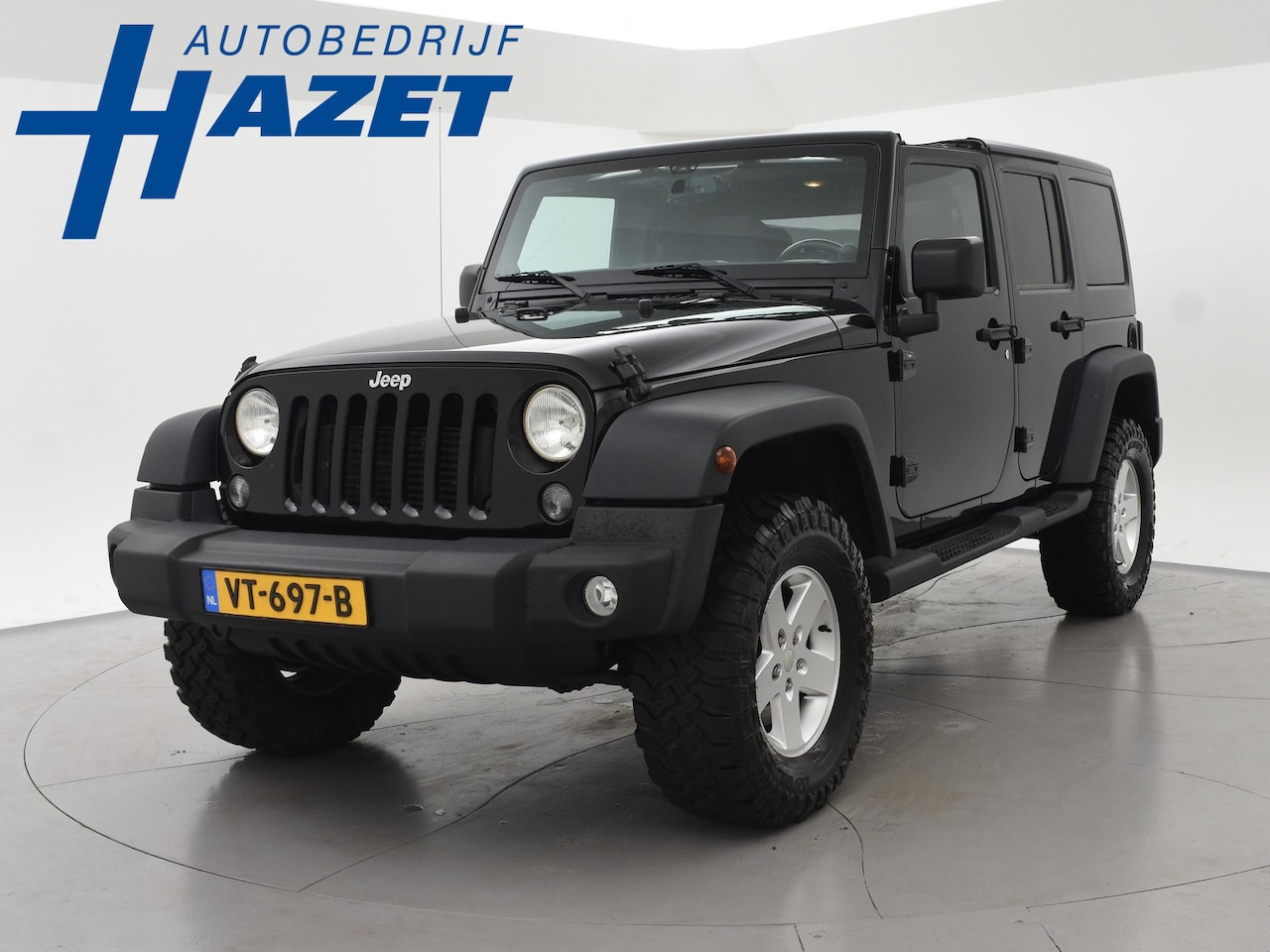 Jeep Wrangler - 2.8 CRD 200 PK SPORT AUT. 4X4 GRIJS KENTEKEN - AutoWereld.nl