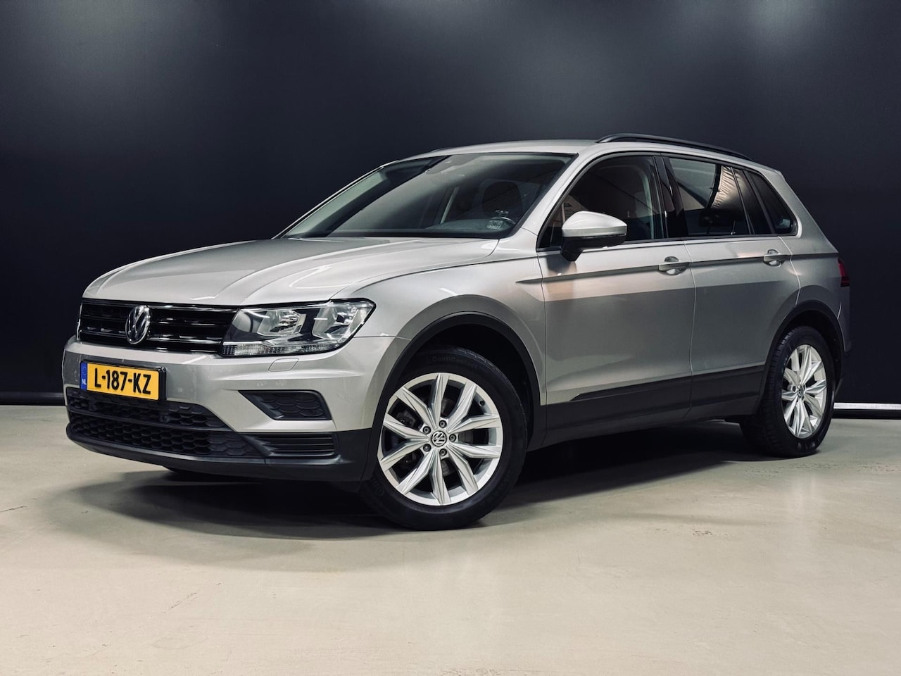 Volkswagen Tiguan - 1.4 TSI 125PK, Navi, Cruise, Clima, PDC, Multistuur, Bluetooth/Tel, Trekhaak 13P, Volledig - AutoWereld.nl