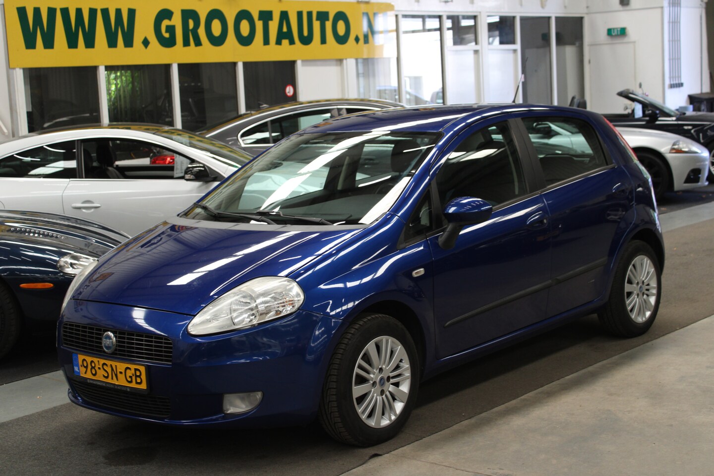 Fiat Grande Punto - 1.4 Edizione Prima Airco, Cruise Control, Stuurbekrachtiging - AutoWereld.nl