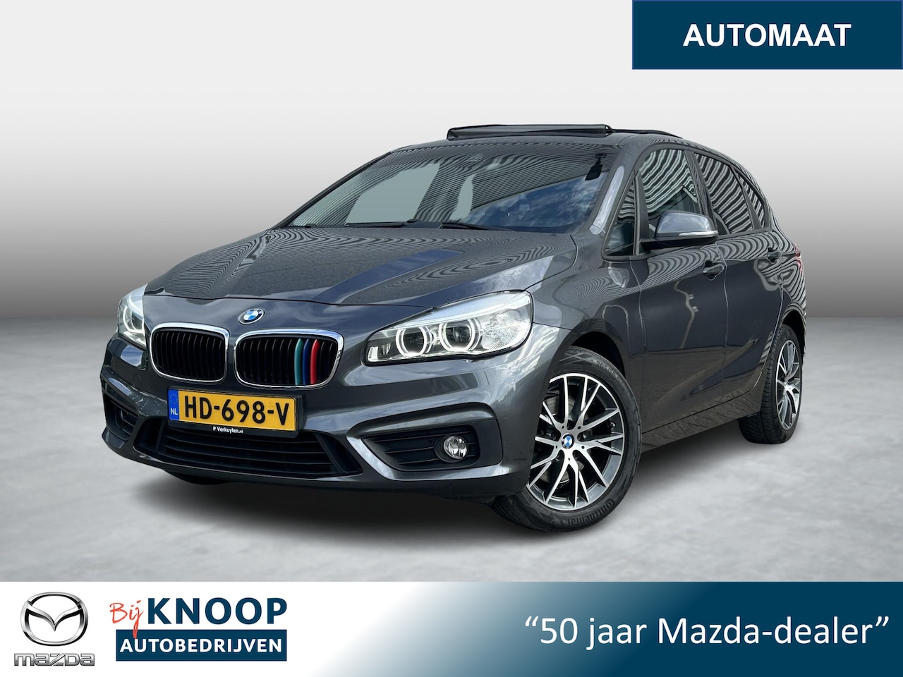 BMW 2-serie Active Tourer - 220i Essential | Trekhaak | Hoge instap | PDC | - AutoWereld.nl