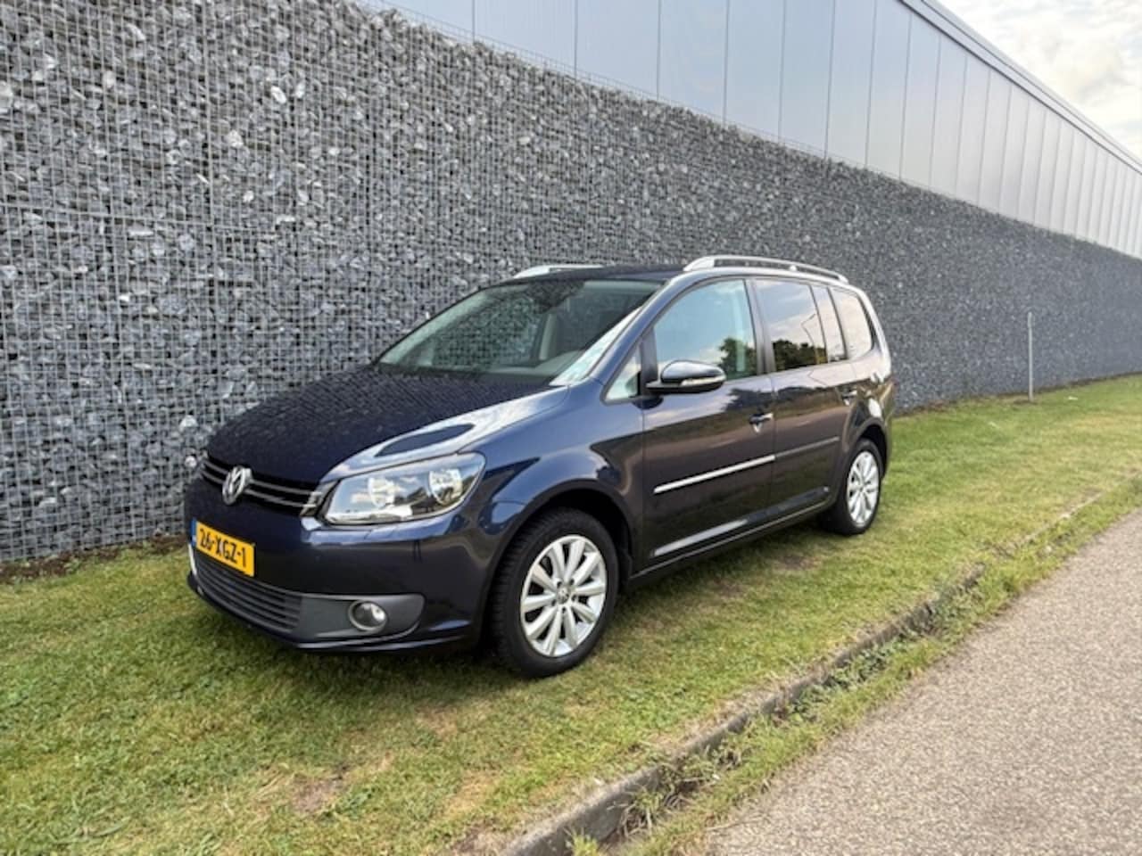 Volkswagen Touran - 1.2 TSI Highl. BM 7persoons - AutoWereld.nl
