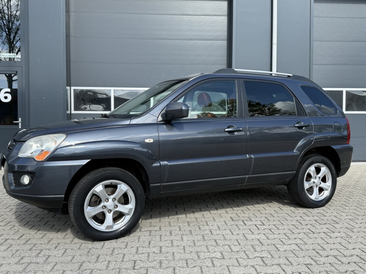 Kia Sportage - 2.0 CVVT Fifteen 2.0 CVVT Fifteen - AutoWereld.nl