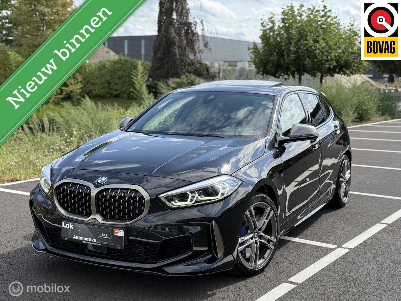 BMW 1-serie - M135i xDrive High Executive PANO|HUD||H&K|MEMORY| - AutoWereld.nl