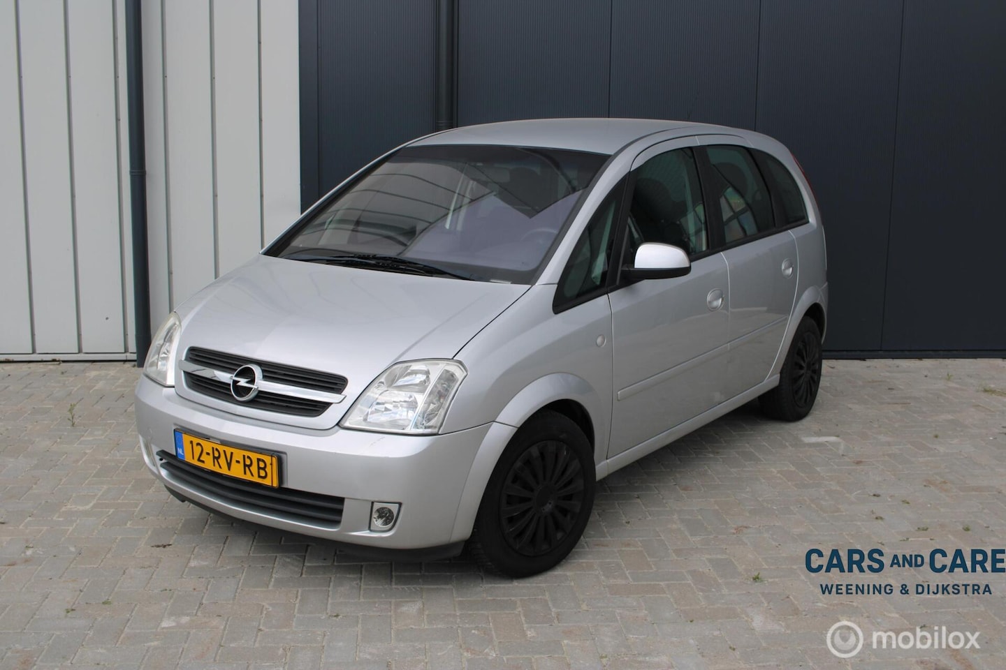 Opel Meriva - 1.8-16V Cosmo 2005 | 88.093 km | Luxe uitvoering - AutoWereld.nl
