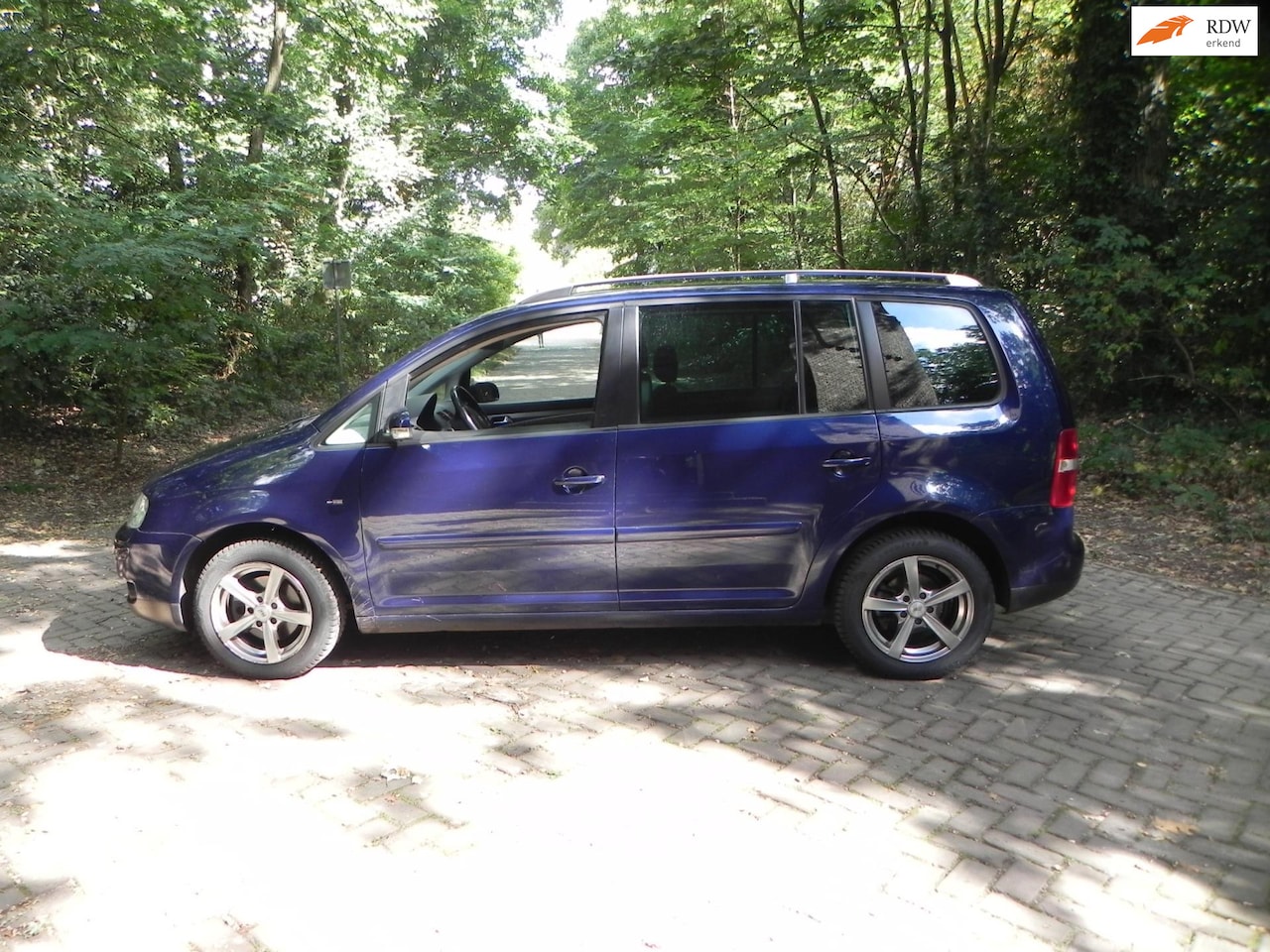 Volkswagen Touran - 2.0-16V FSI Highline 2.0-16V FSI Highline - AutoWereld.nl