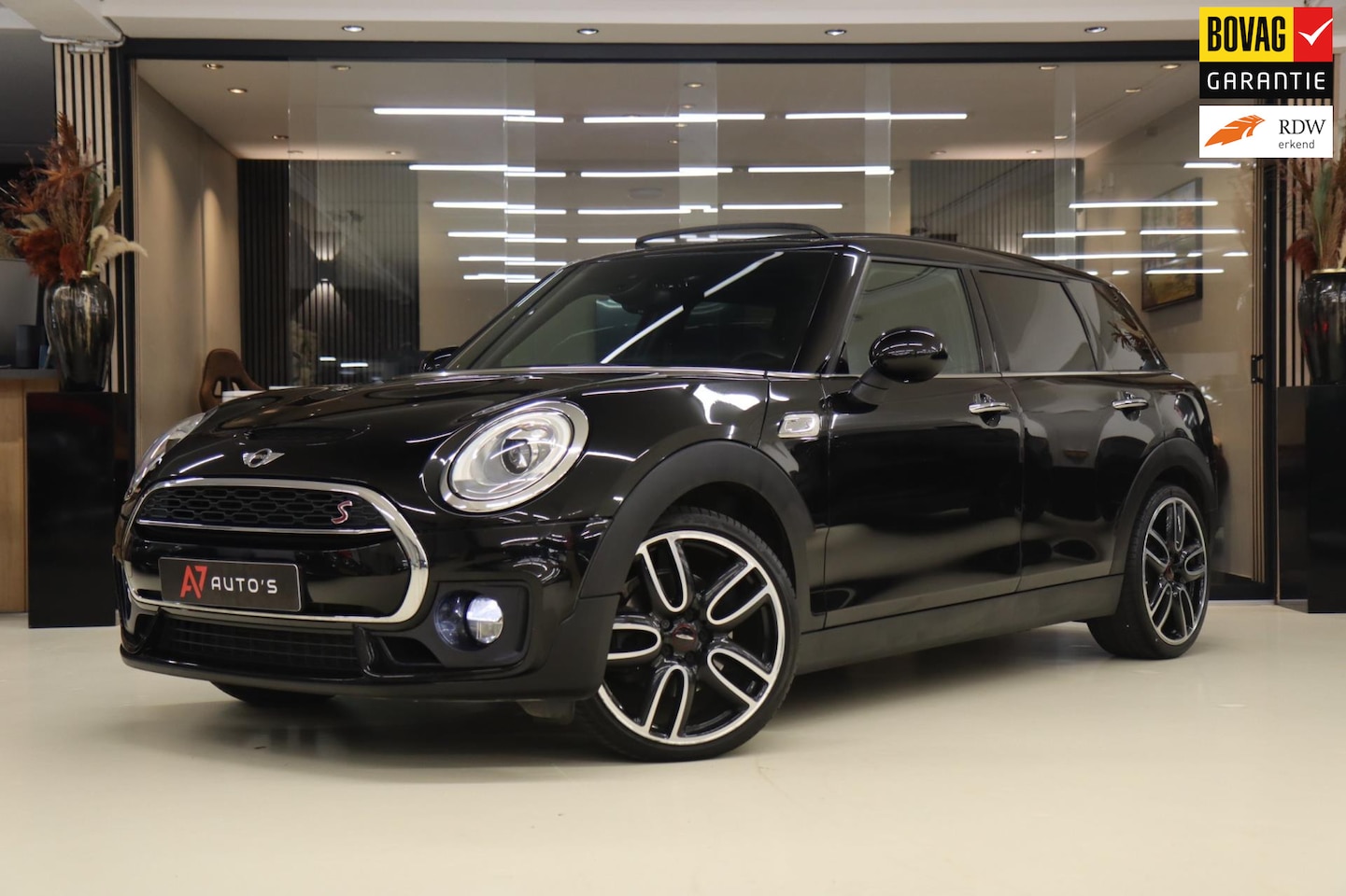 MINI Clubman - Mini NAVI/KEYLESS/STOELVERWARMING/PANO/LEDERSPRTSTOELEN - AutoWereld.nl