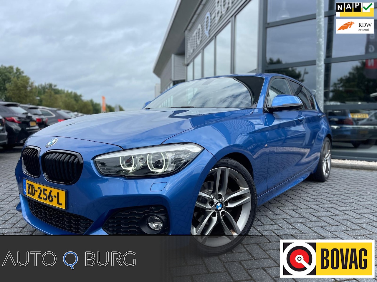 BMW 1-serie - 118i Edition M Sport Shadow High Executive | Automaat | Navigatie | Camera | PDC | Cruise - AutoWereld.nl