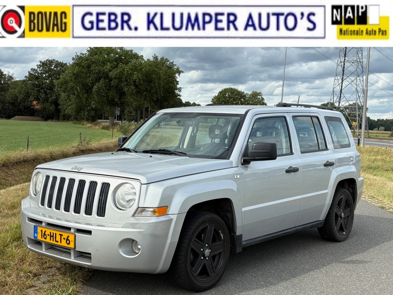 Jeep Patriot - 2.4 Sport Adventure Navi, Cruise, Airco, Trekhaak, Isofix - AutoWereld.nl