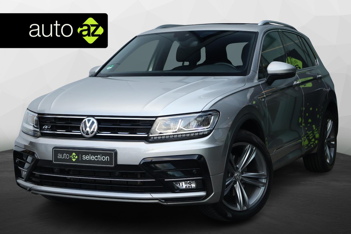 Volkswagen Tiguan - 1.4 TSI 4Motion Highline Business R / Panorama / Stoelverwarming - AutoWereld.nl