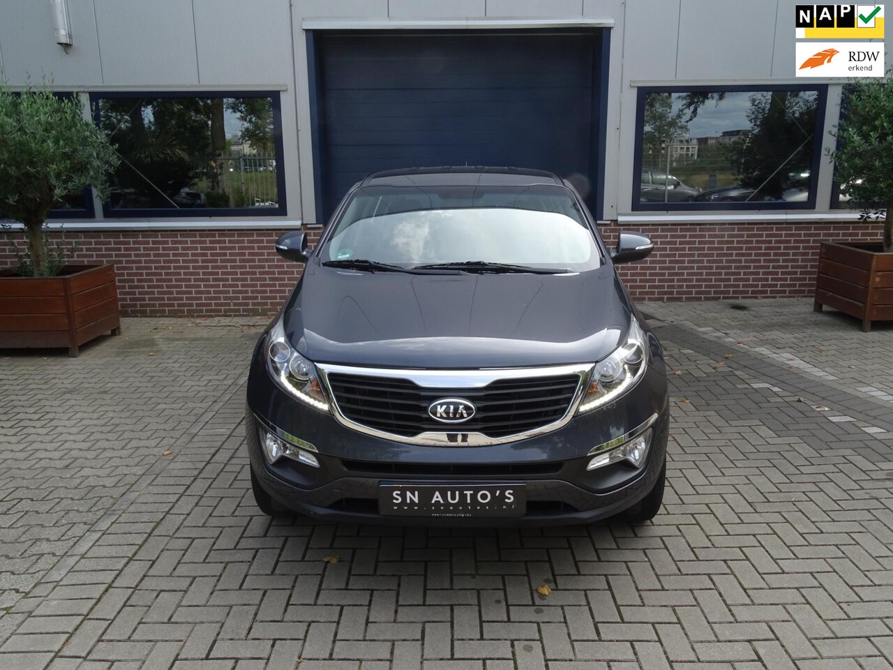 Kia Sportage - 2.0 X-ecutive 4wd 2.0 X-ecutive 4wd - AutoWereld.nl
