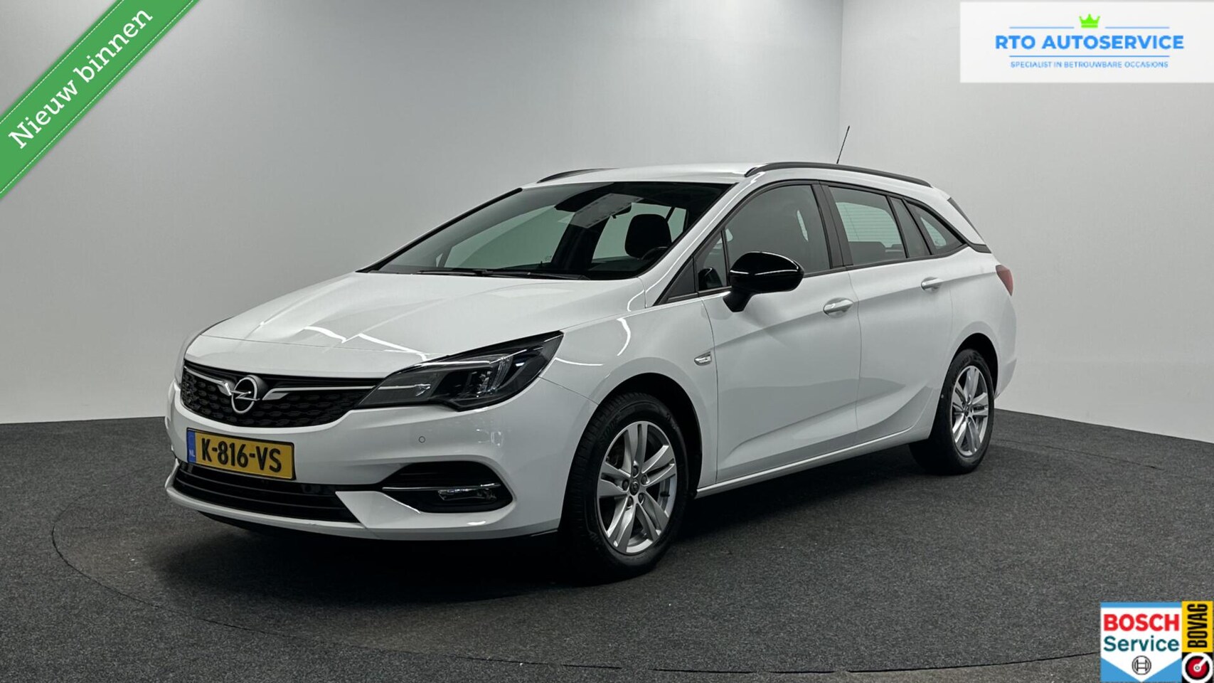 Opel Astra Sports Tourer - 1.2 Edition LM TREKHAAK NAVI CAMERA CRUISE - AutoWereld.nl