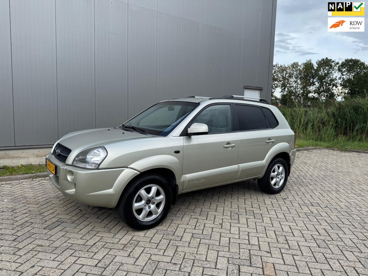 Hyundai Tucson - 2.0i Dynamic Airco Cruise Trekhaak Isofix Nap - AutoWereld.nl