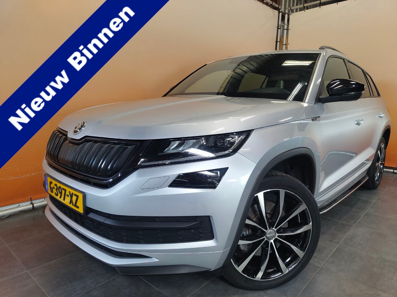 Skoda Kodiaq - 2.0 TSI 4x4 Sportline Business bomvol! pano | sportint | stoelverw | digitaal dashb | trek - AutoWereld.nl