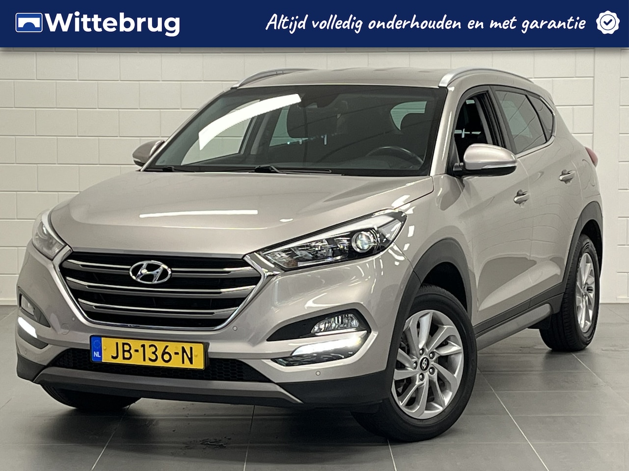 Hyundai Tucson - 1.6 GDi Comfort TREKHAAK | NAVIGATIE | CLIMATE CONTROL | STOELVERWARMING - AutoWereld.nl