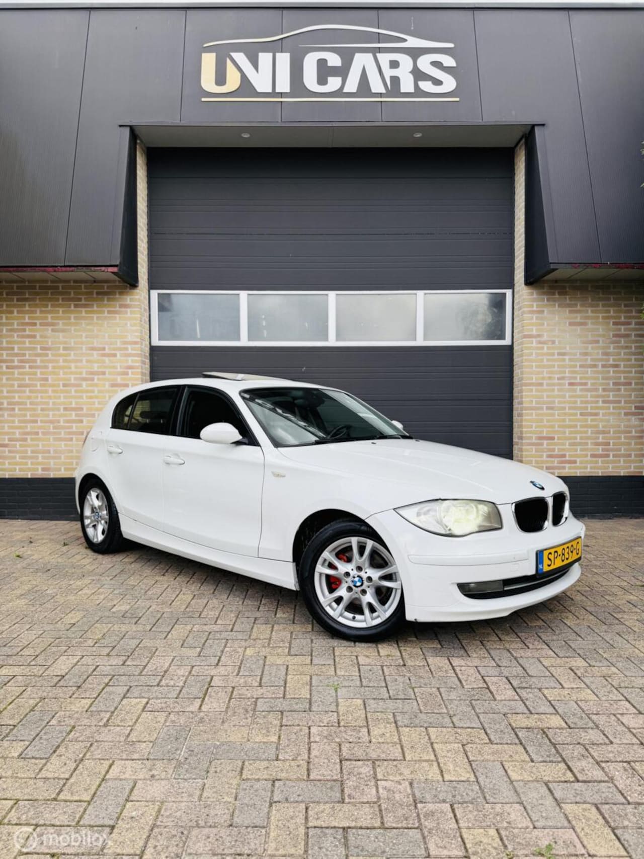 BMW 1-serie - 116i Executive|Airco|Open dak|ST Verwarming|APK - AutoWereld.nl