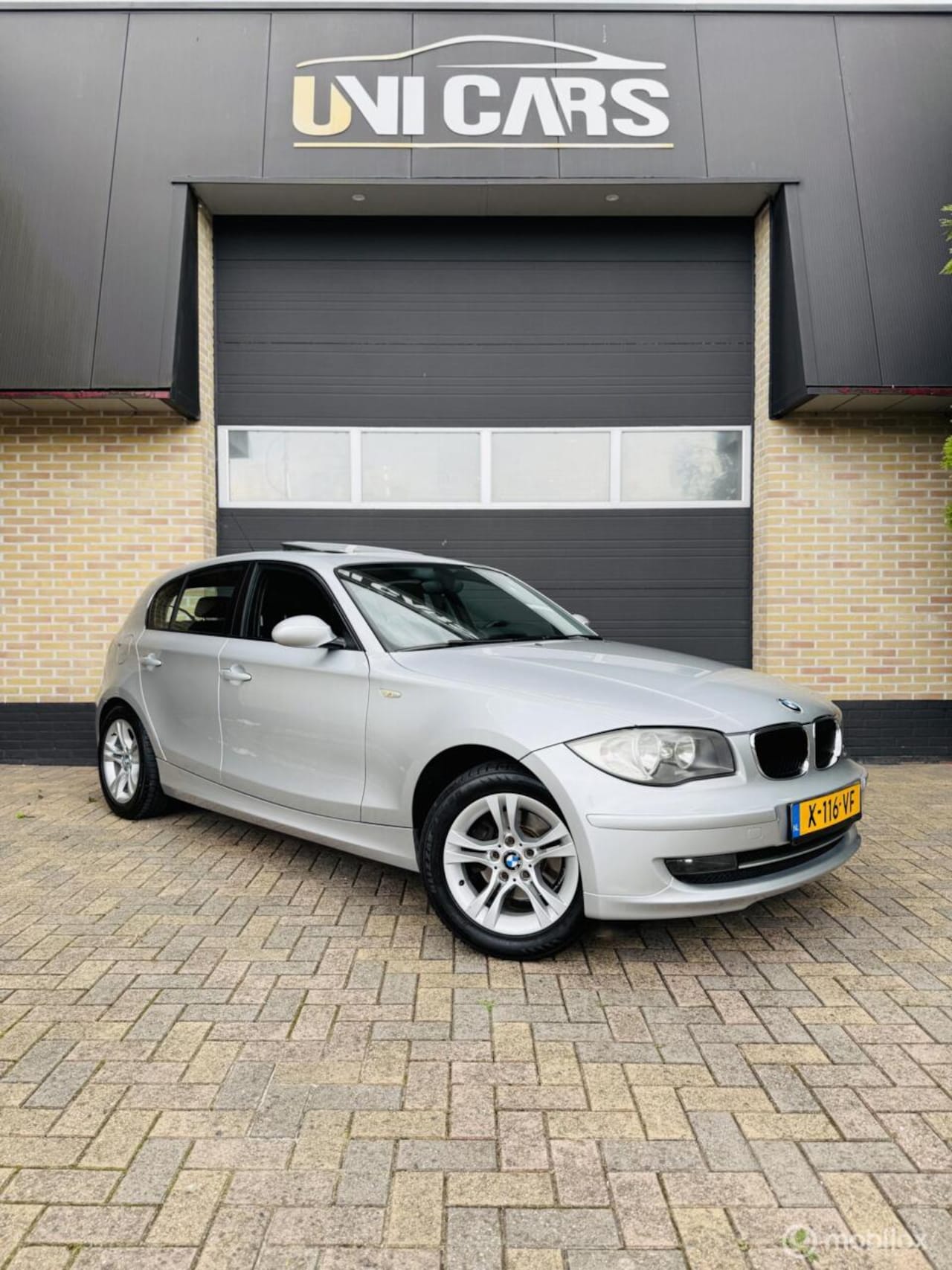 BMW 1-serie - 118i Executive|Open dak|Navi|Clima|Nieuw Staat.! - AutoWereld.nl