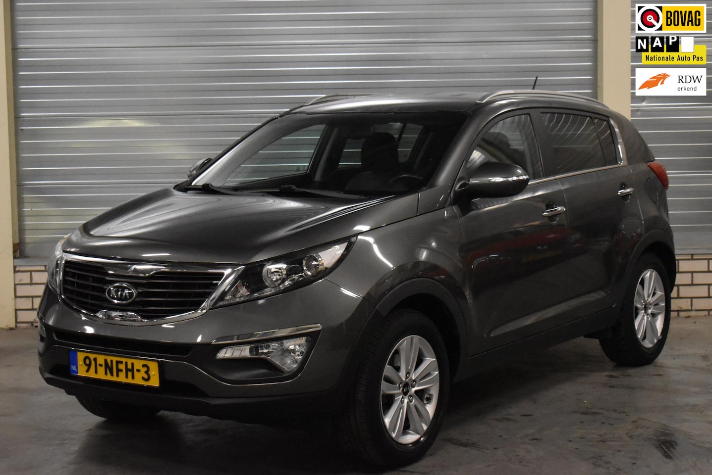 Kia Sportage - 2.0 X-ecutive Plus Pack + Half Leder|Climate Control|Bluetooth|Cruise Control|Parkeersenso - AutoWereld.nl