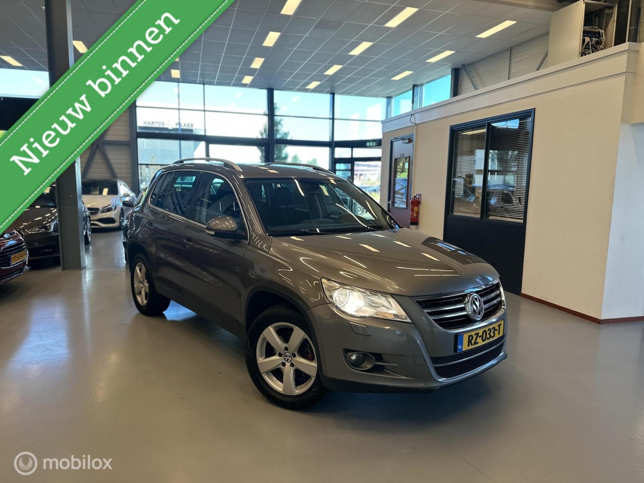 Volkswagen Tiguan - 1.4 TSI Track&Field 4Motion Navi|Cruise| - AutoWereld.nl