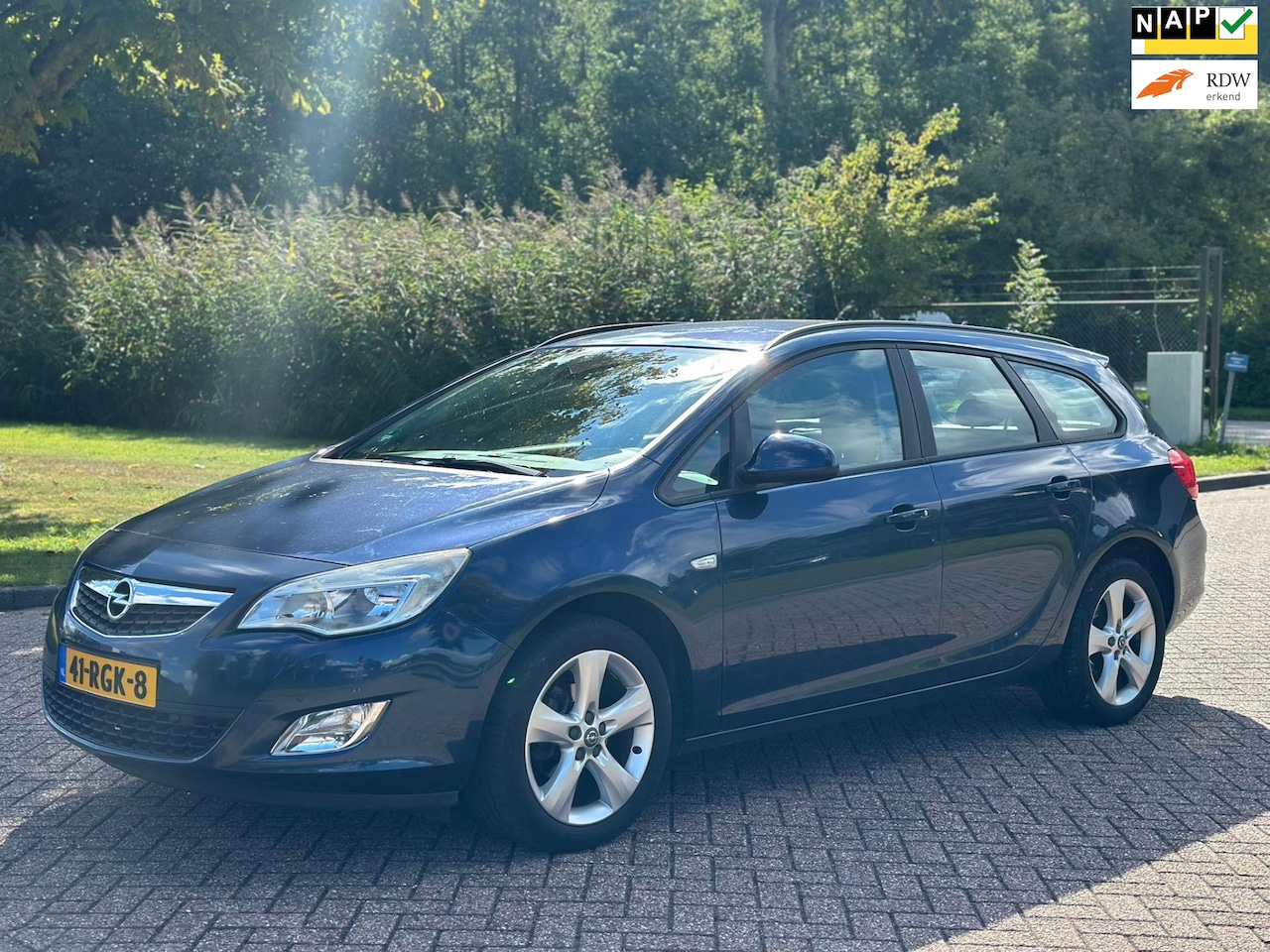 Opel Astra Sports Tourer - 1.4 Turbo Edition/APPLE CARPL/AIRCO/CRUISE/PARKEERSENS VOOR-ACHTER/VERWARMDE VOORST - AutoWereld.nl