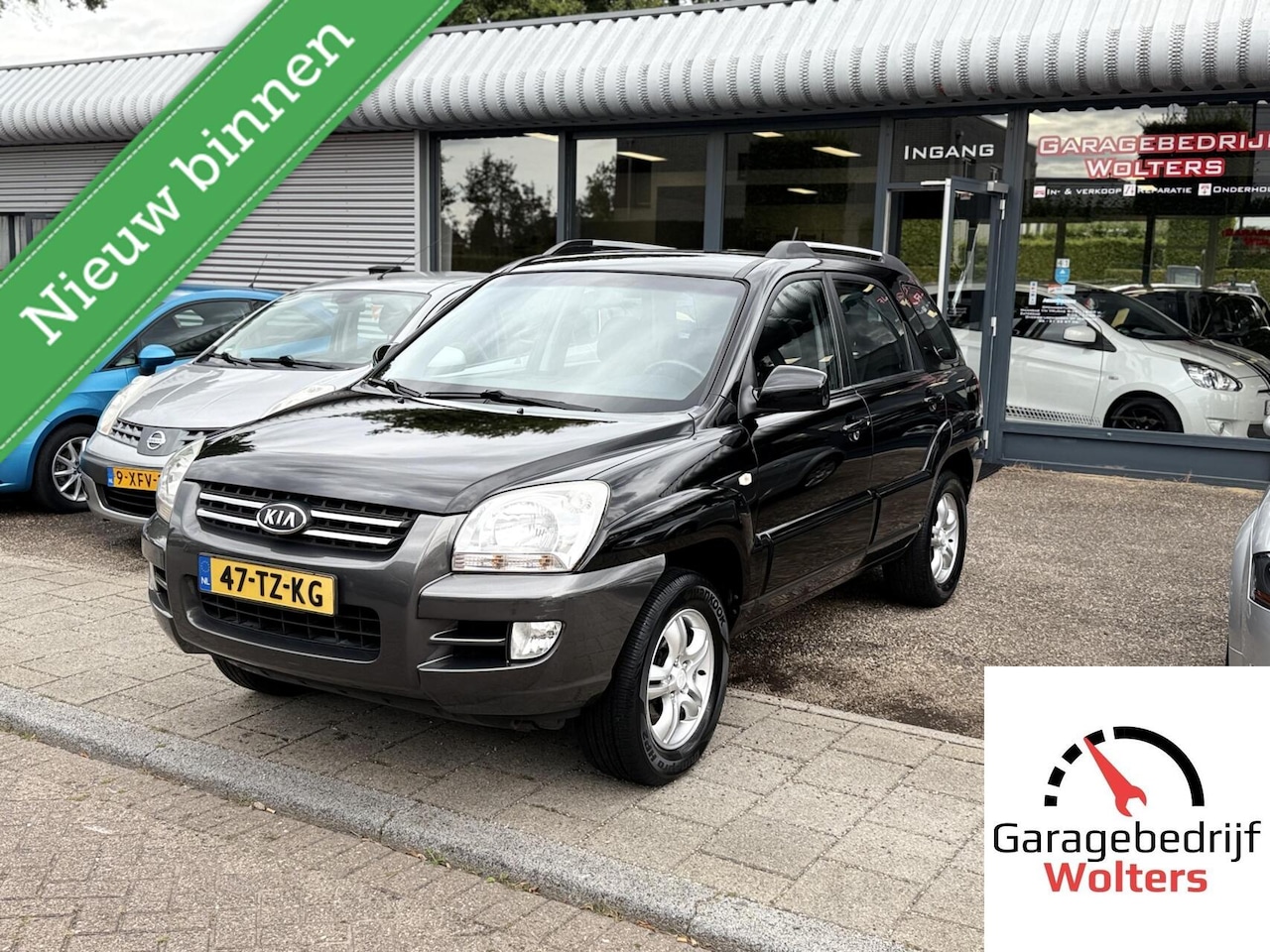 Kia Sportage - 2.0 CVVT Comfort AIRCO SET WINTERBANDEN TREKH. - AutoWereld.nl
