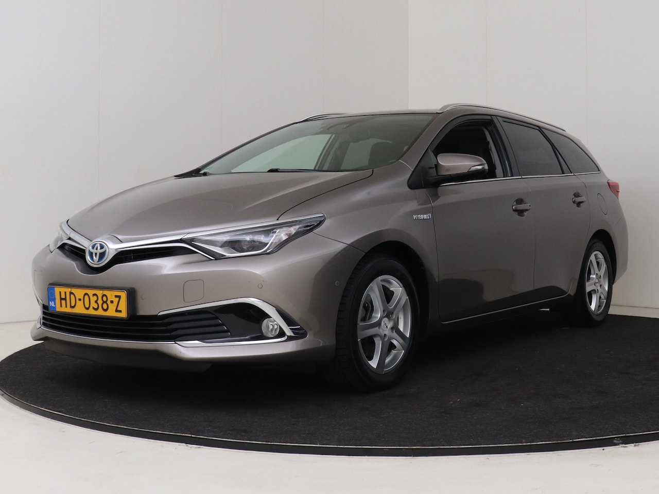 Toyota Auris Touring Sports - 1.8 Hybrid Lease pro I Navigatie I Climate Control I Cruise Control I Panoramadak I Stoelv - AutoWereld.nl