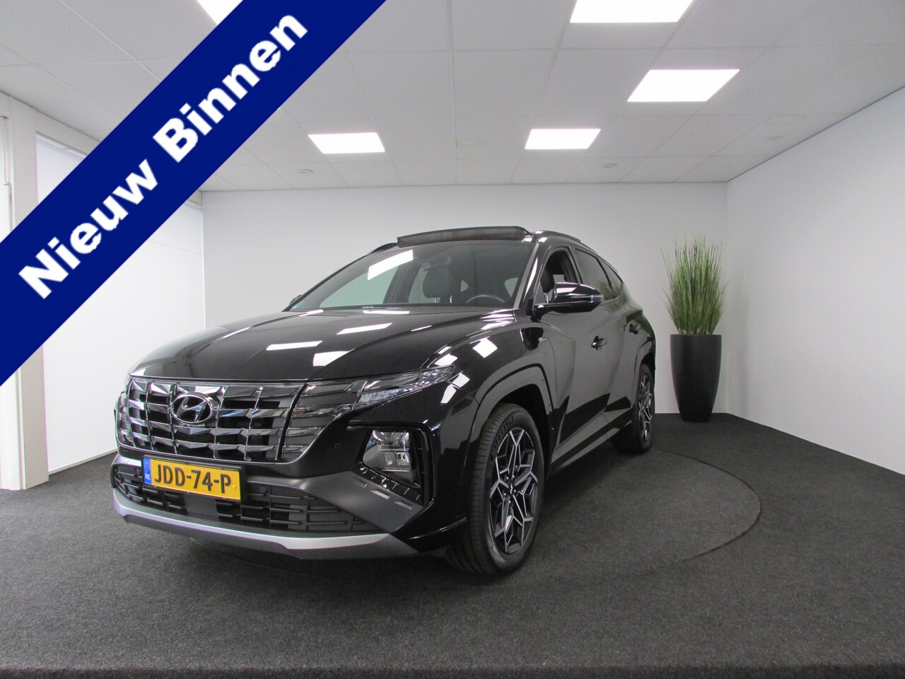 Hyundai Tucson - 1.6 T-GDI PHEV N Line Sky 4WD I Panoramadak I Achteruitrijcamera I Elektrische achterklep - AutoWereld.nl