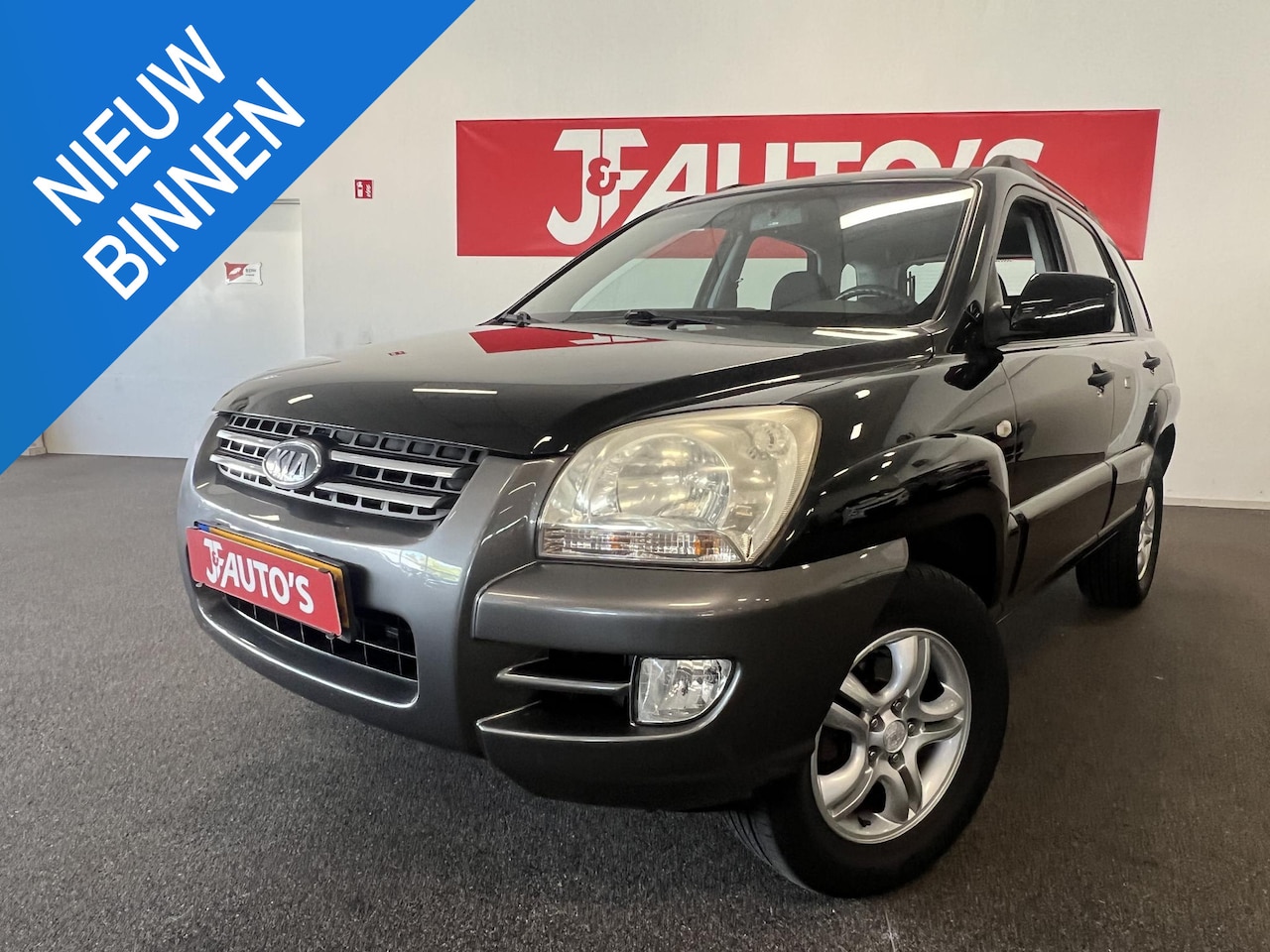 Kia Sportage - 2.0 CVVT Comfort AIRCO, ELEC PAKKET, CRUISE,  APK 03-2026 - AutoWereld.nl