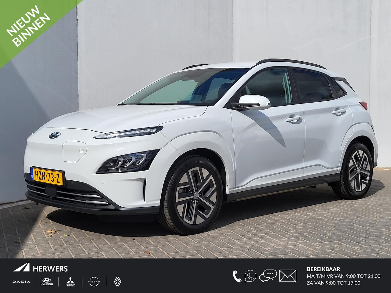 Hyundai Kona Electric - EV Business 64 kWh Automaat / Dealer onderhouden / HUD / Navigatie / Stuur- en stoelverwar - AutoWereld.nl